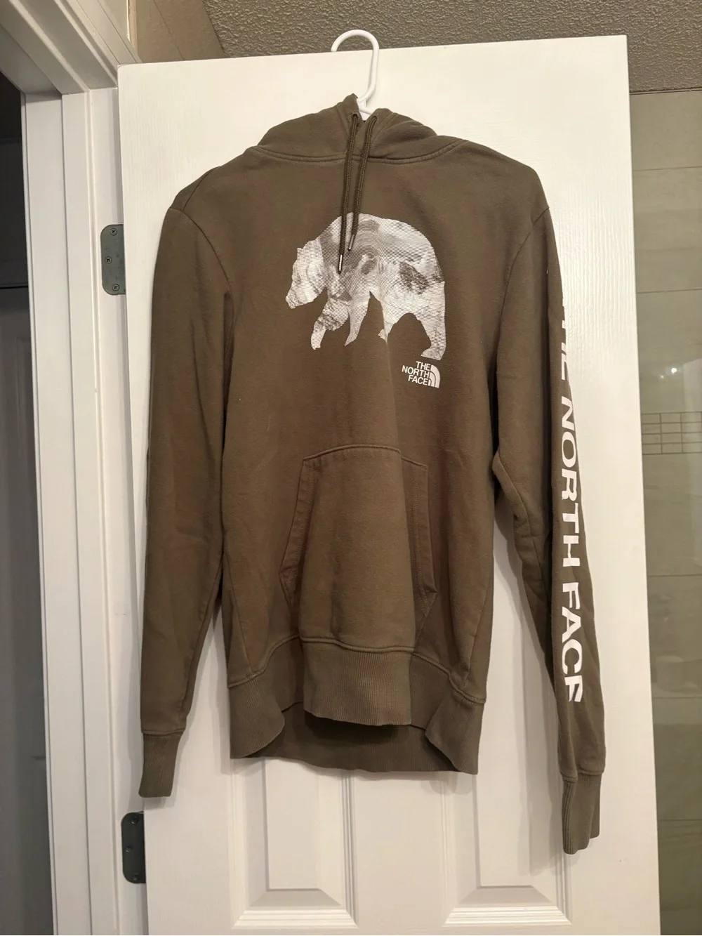 The North Face Men's Brown Zip-Up Hoodie with Bear Graphic